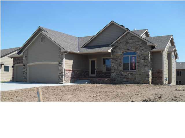 Beautiful Brick and Stone front with large porch o