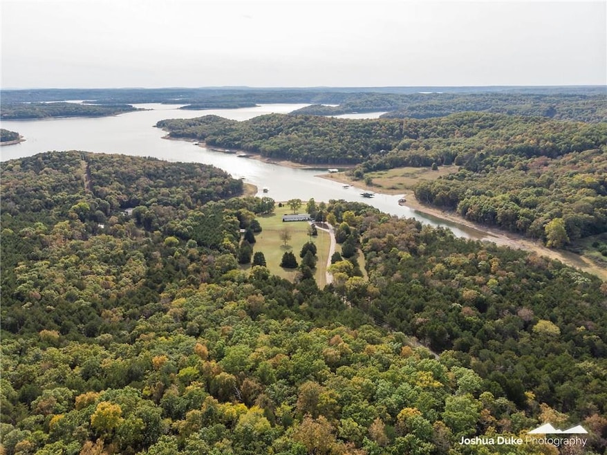 Aerial view of the property and lake.  Beautiful!!