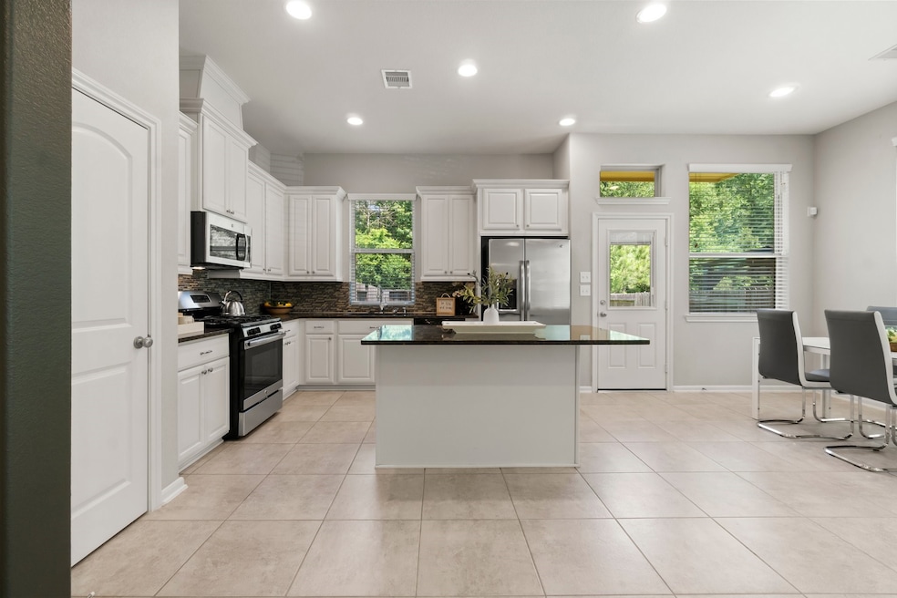 Spacious open-concept living area ideal for hostin