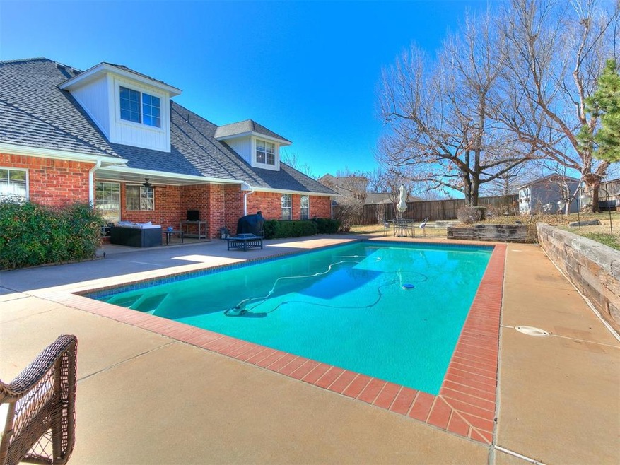 View of swimming pool featuring fence, a fenced in