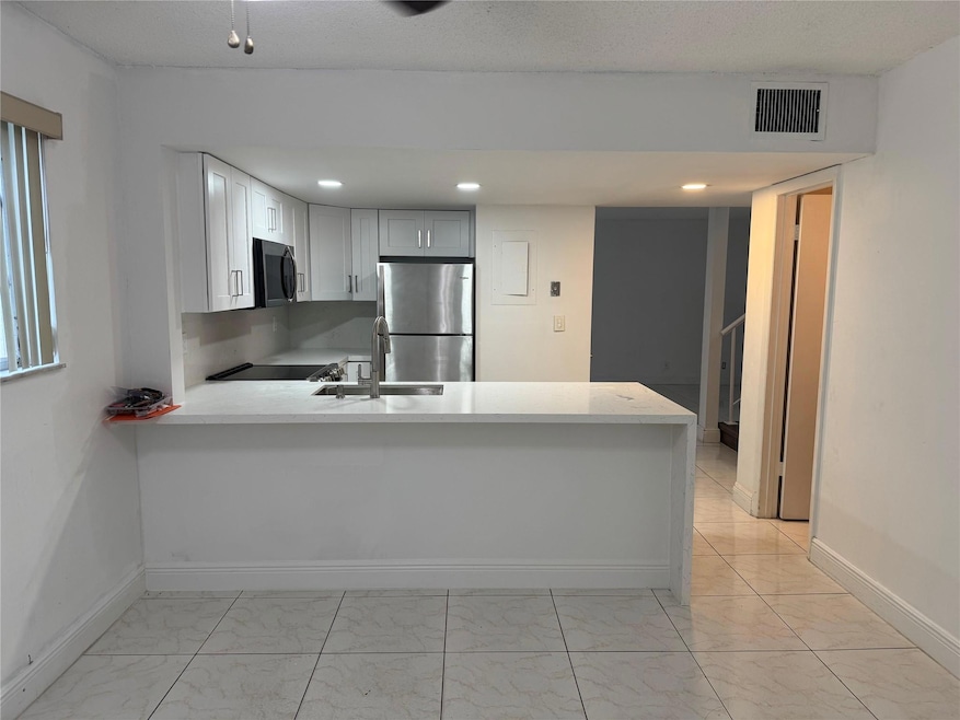 8031 Lagos de Campo Blvd unit L3, Tamarac, FL 33321 - photo 1