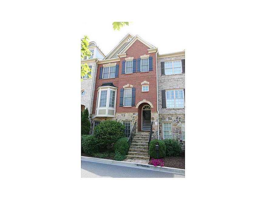 Exterior Front. Stately Brick Townhome in popular 