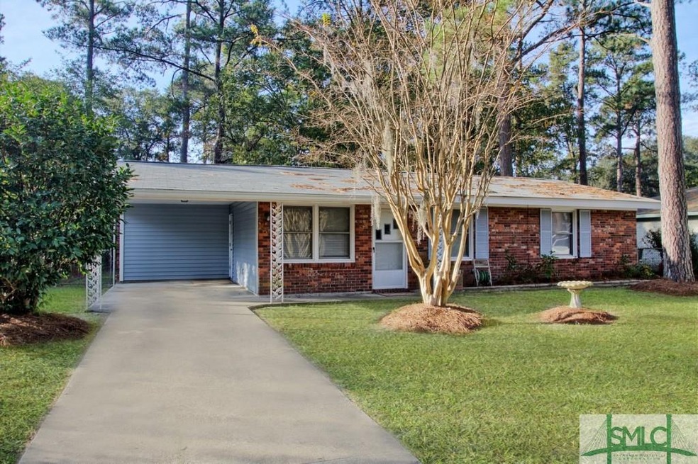 SIDE VIEW WITH CARPORT