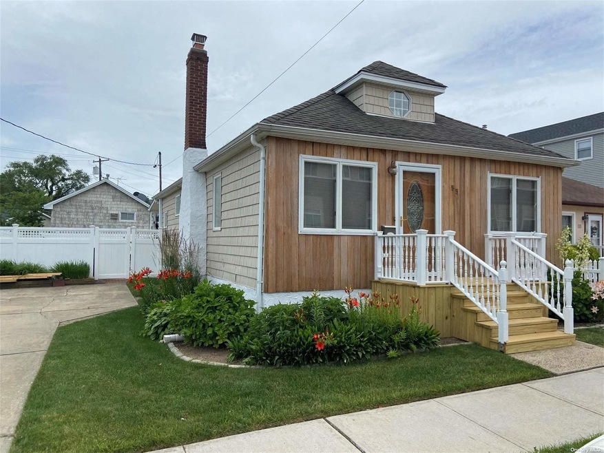 55 Deal Rd, Island Park, NY 11558 - photo 1