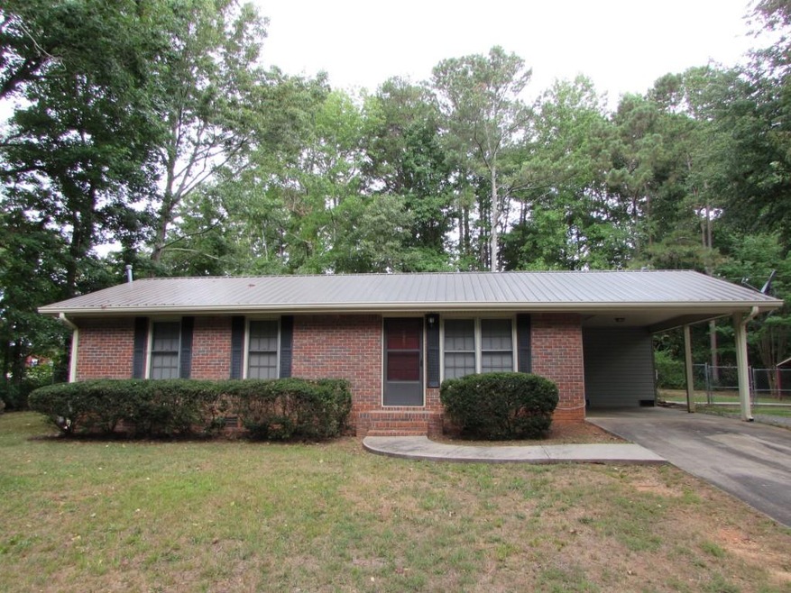 Maintenance free living! All brick with vinyl trim