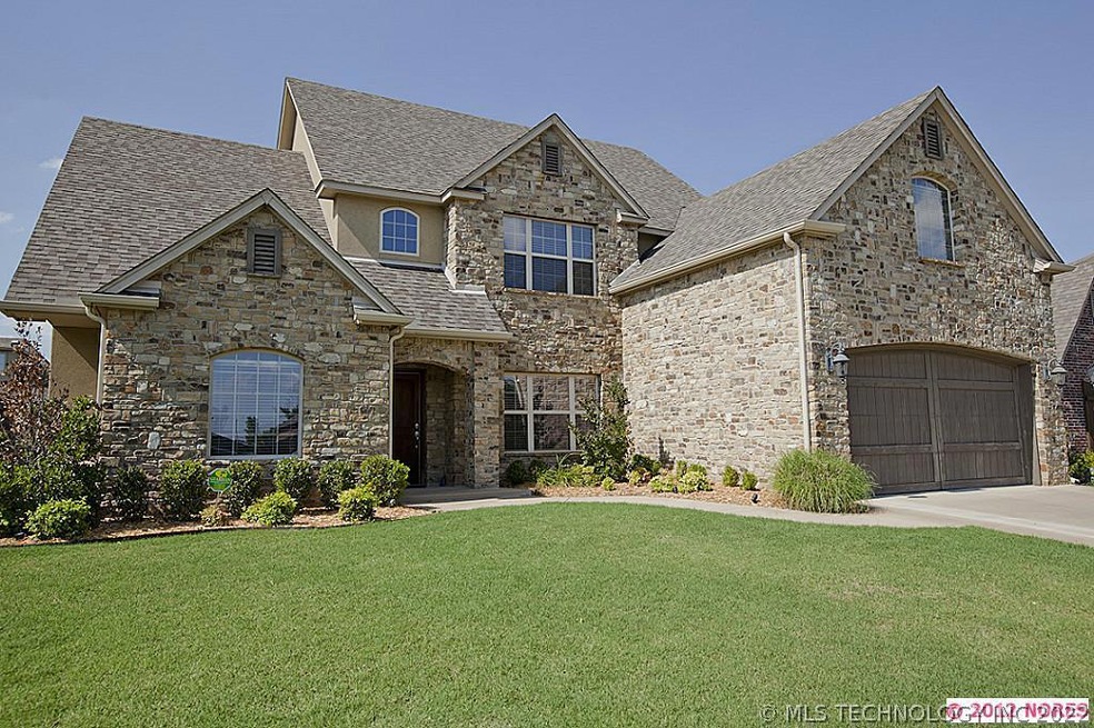 Stunning stone & stucco home in desirable Country