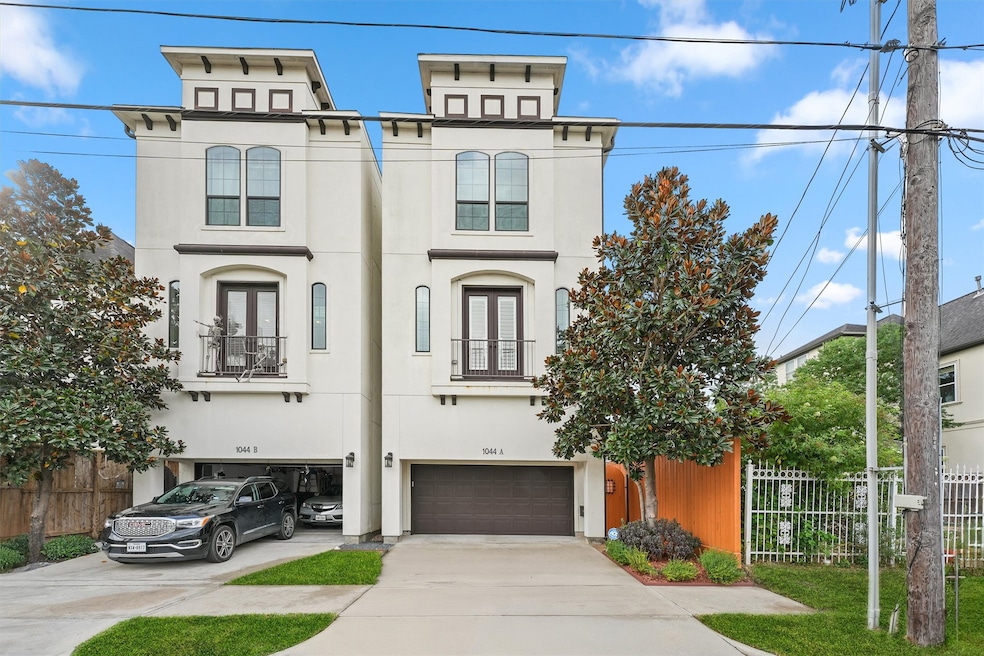 This is a modern, multi-story duplex with a light