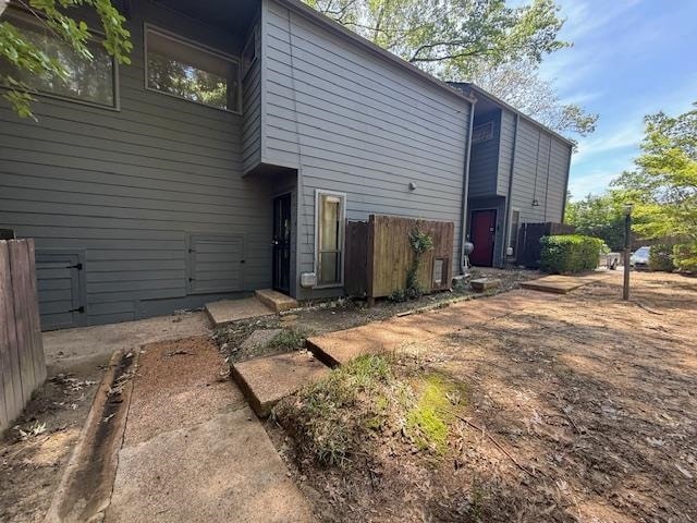 Back of property featuring fence