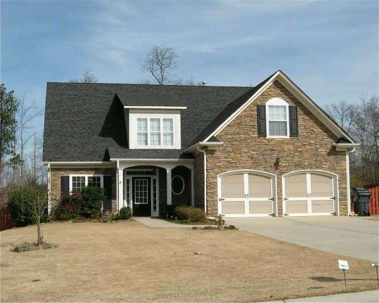 Exterior Front. BEAUTIFUL 2 STORY STONE FRONT HOME