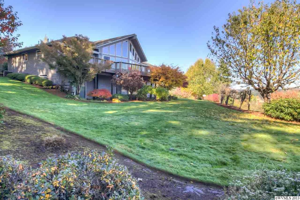 Situated on hillside with sweeping views