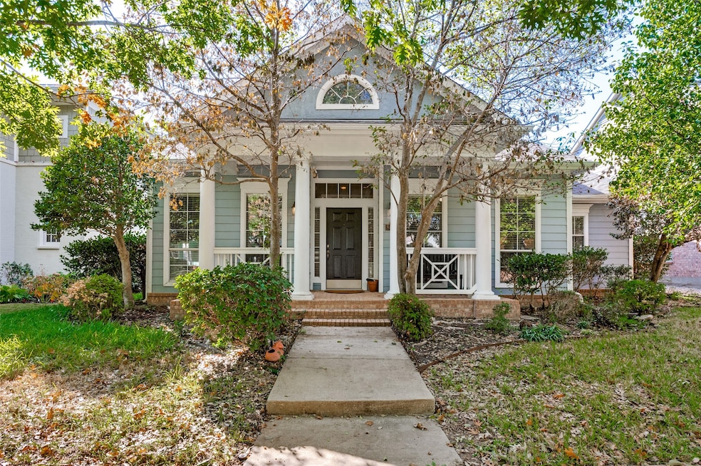 Greek revival inspired property featuring covered porch