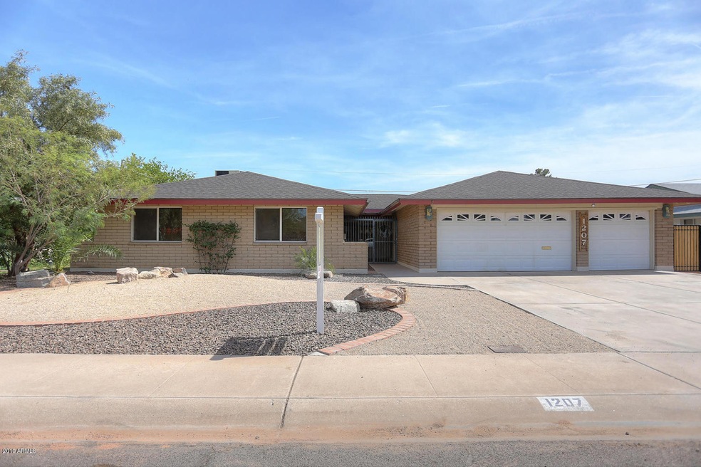 1207 E. Loyola Dr