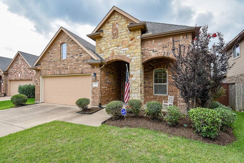 Welcome home! Beautiful stone and brick exterior w