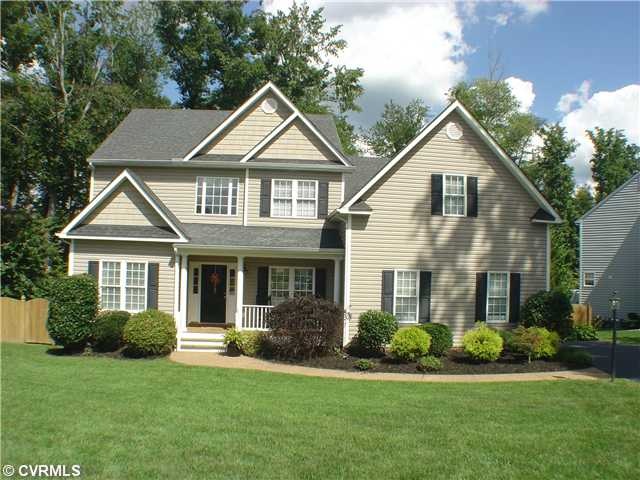 Exterior Front - Vinyl siding, gutters,  irrigatio