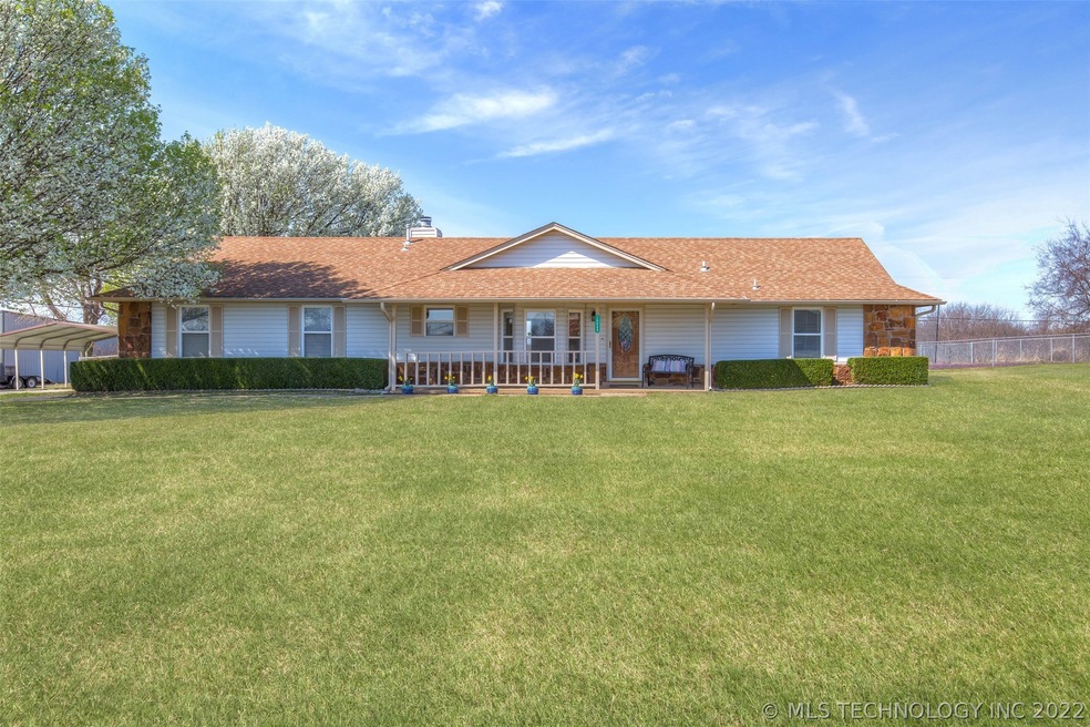 Beautiful home located on 1 acre m/l in Collinsvil