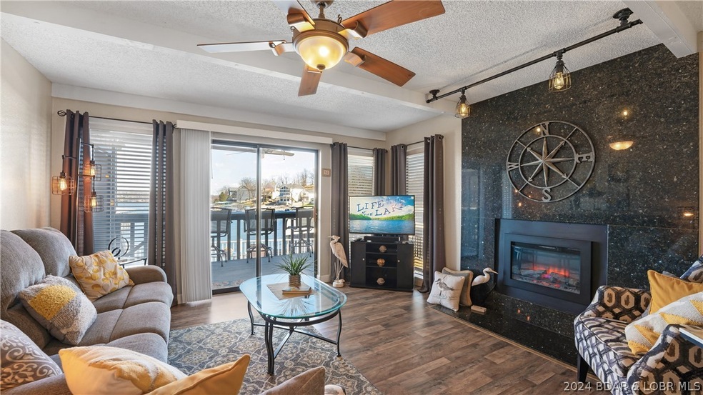 Welcome to luxurious Lakefront Living at Heron Bay