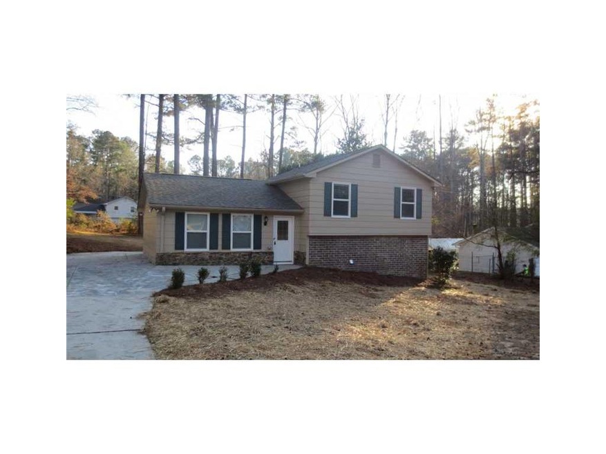 2776 Spanish Oak Dr SW, Lilburn, GA 30047 - photo 1