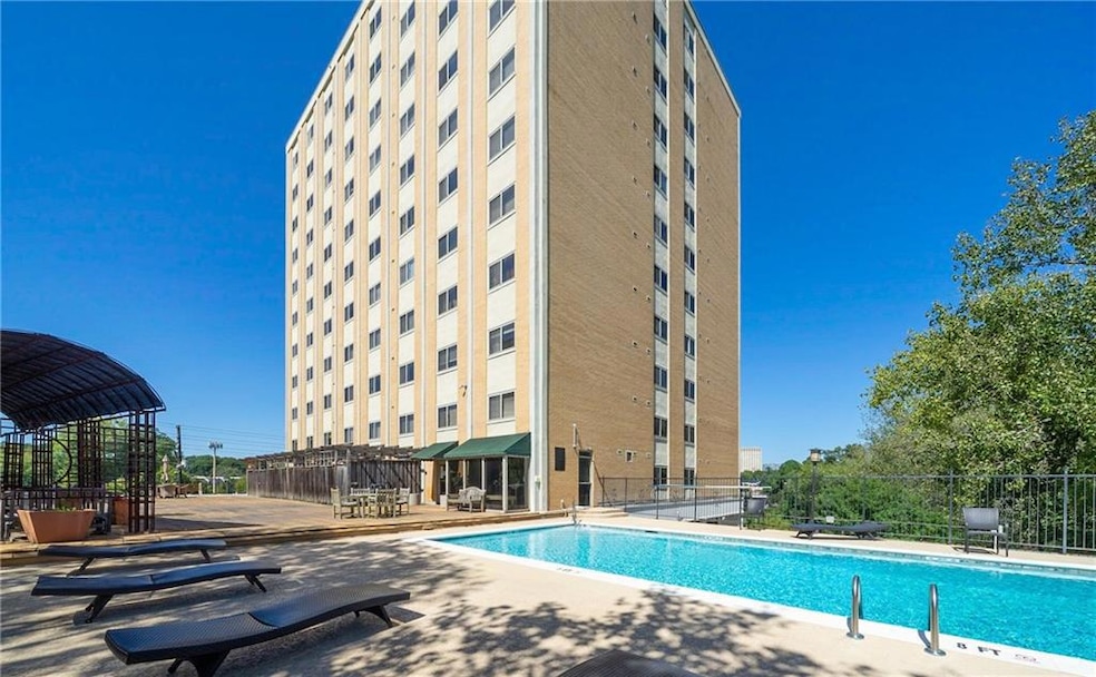 Community pool with a patio area