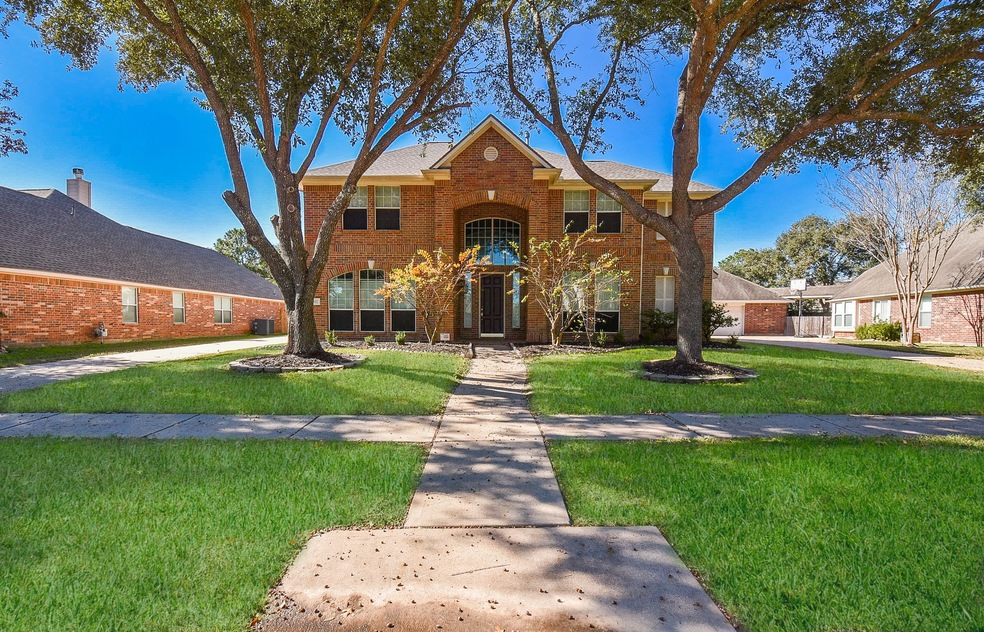 8811 Sunny Ridge Dr, Houston, TX 77095 - photo 1