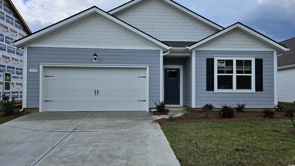 Ranch-style house with driveway, an attached garag