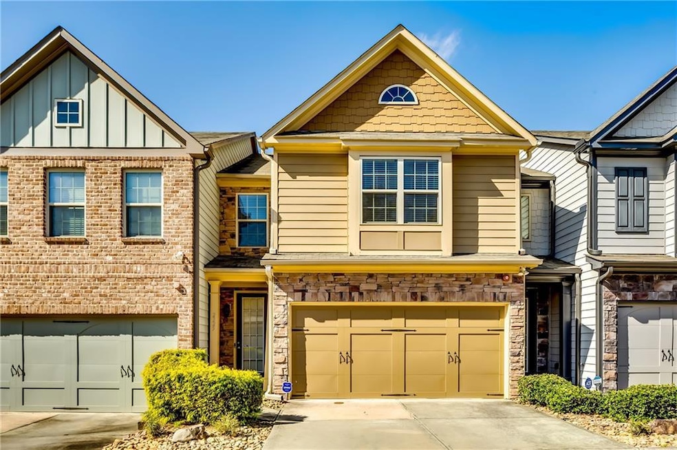 Multi unit property with a garage, board and batte