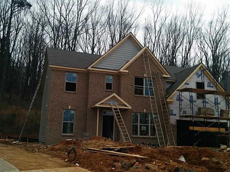 Exterior Front. Full brick front with lap siding a