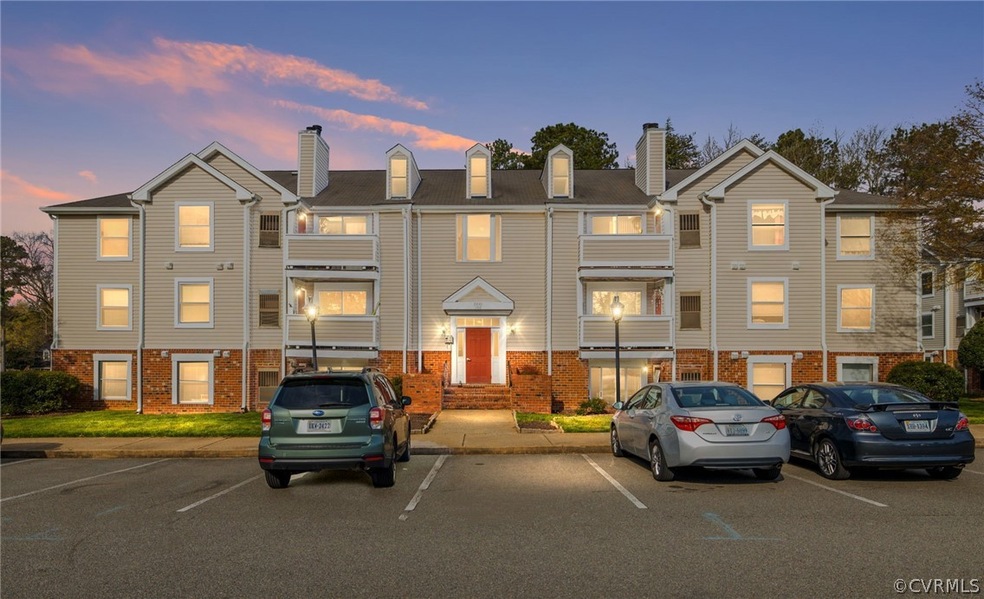 Outdoor building at dusk featuring a garage