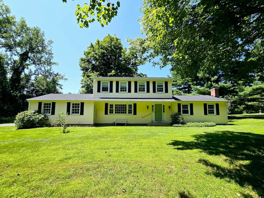 Sweet Colonial with Vinyl siding, new shutters and