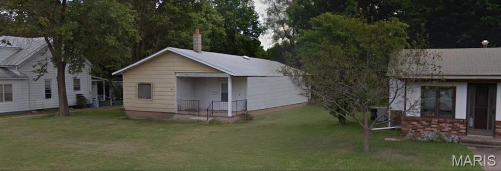 View of front of house featuring a front lawn