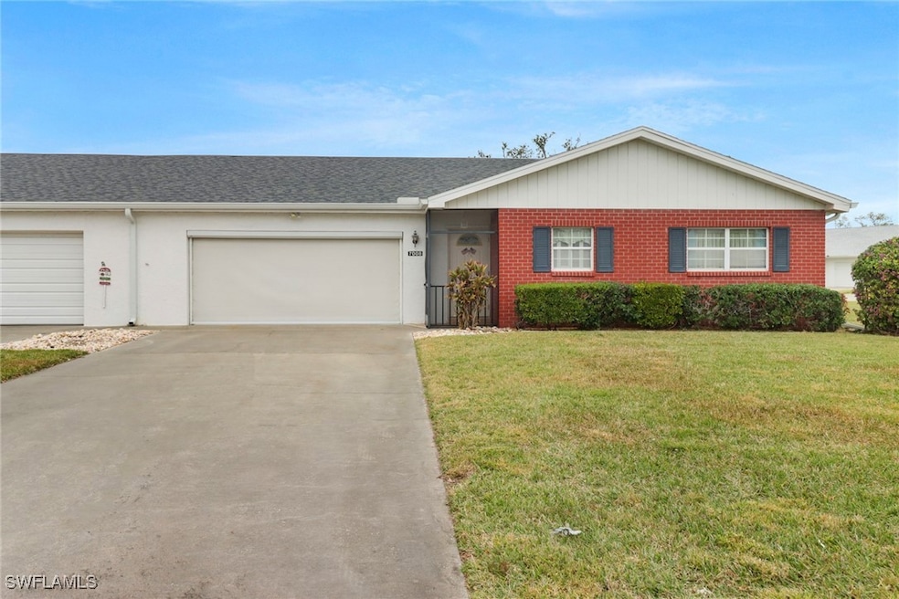 Lovely attached villa with 2-car garage and ample