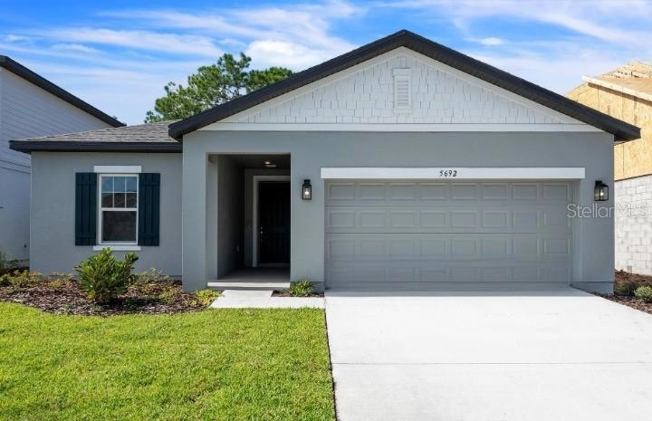 5692 Brosnan Rd, Magnolia Square, FL 34771 - photo 1