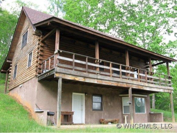 Log Home on 7.05 Acres!