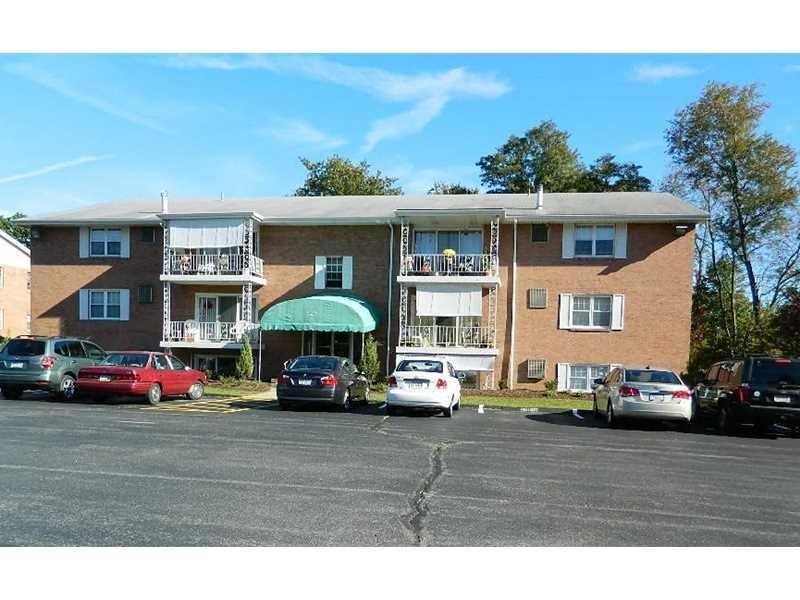 Exterior Front. All Brick Building with security l