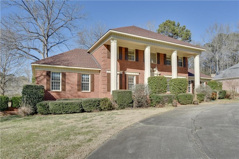 Exterior Front with circular driveway.