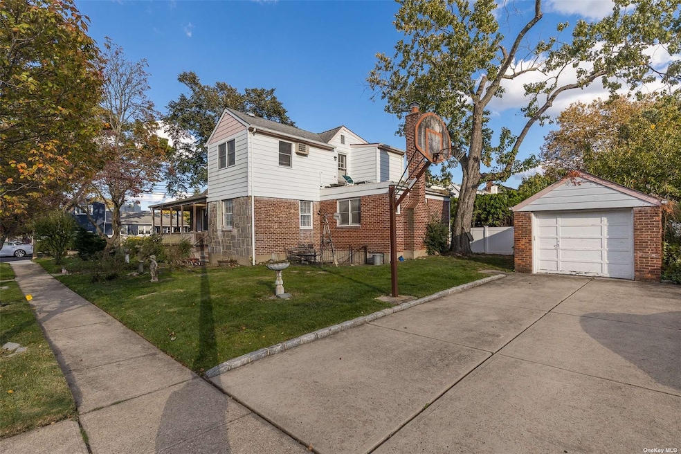 109 Woods Ave, Malverne, NY 11565 - photo 1