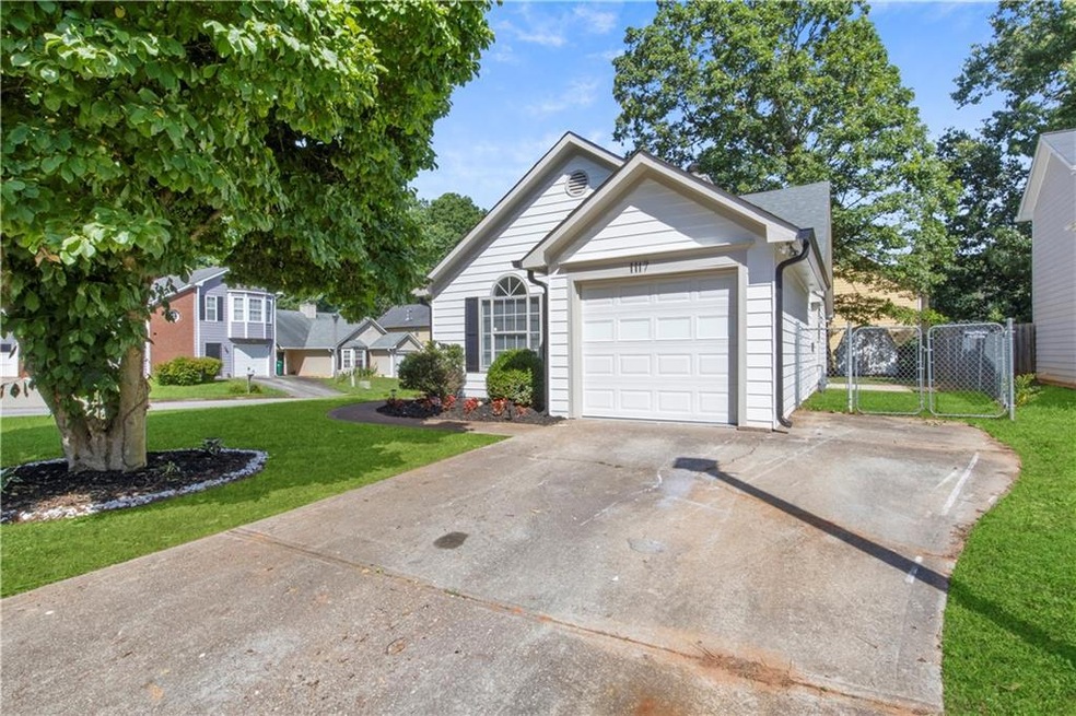 View of front of property with a front yard