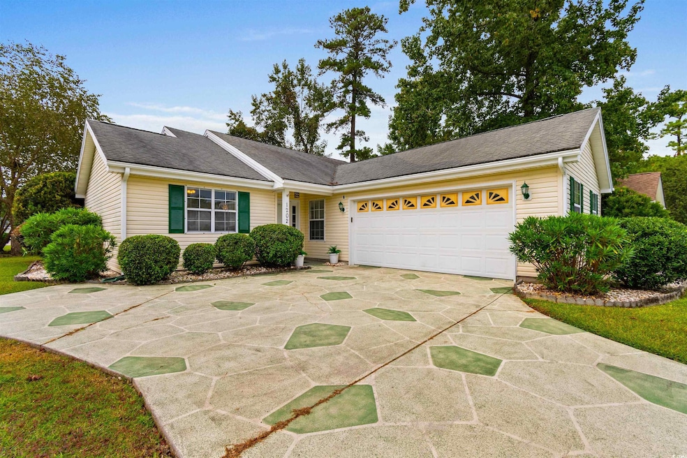 Ranch-style house featuring a garage