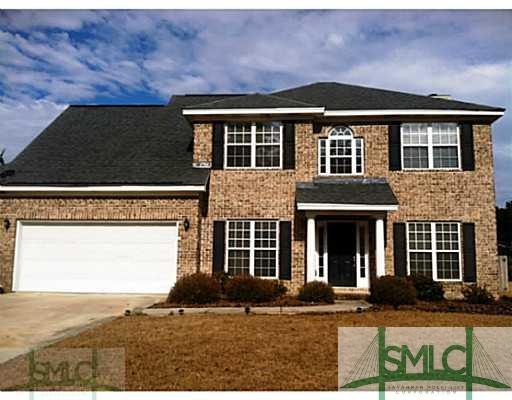 Exterior Front. Admire this beautiful brick home!