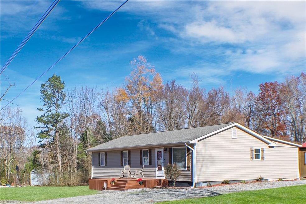 Ample parking. Newly stained deck.  Spacious .7acre lot.