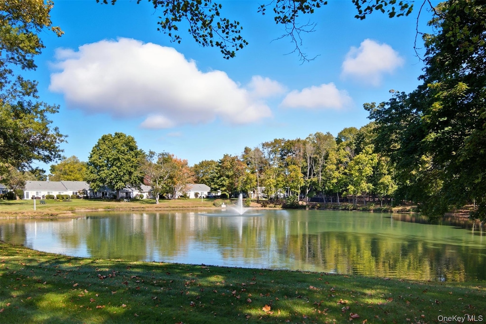 607 Cabot Ct E unit C607, Saint James, NY 11780 - photo 1