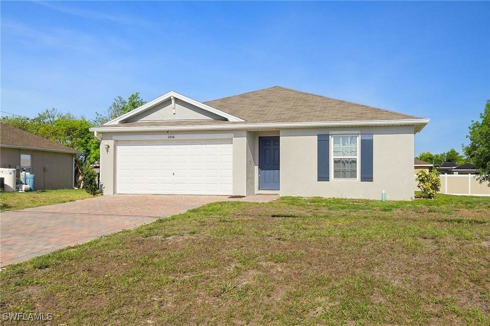 Ranch-style house with stucco siding, decorative d