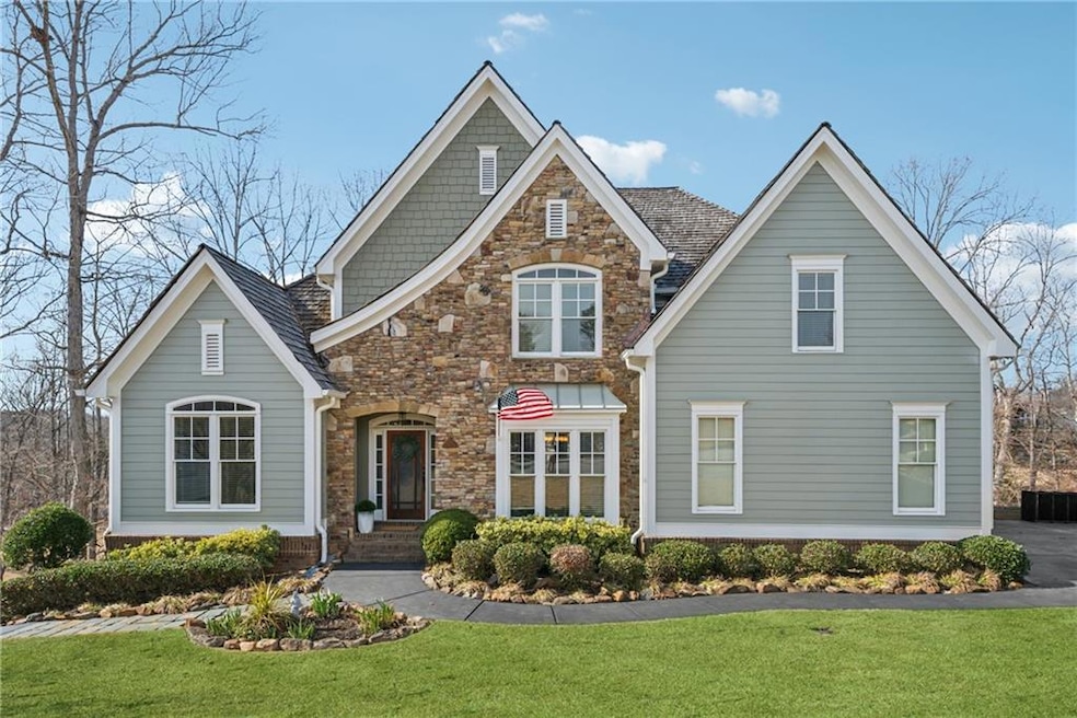 View of front House featuring stone, siding, newly