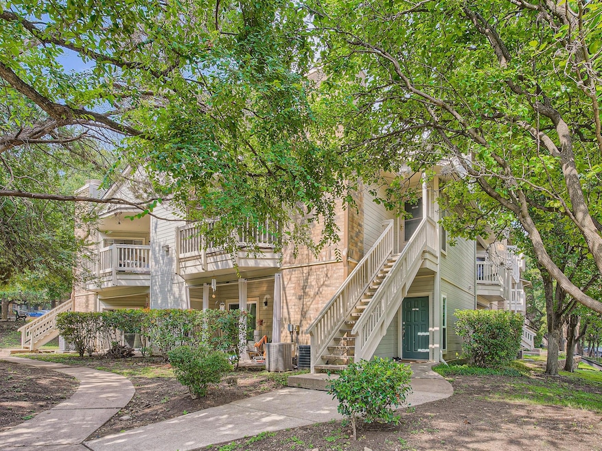 View of property with stairway