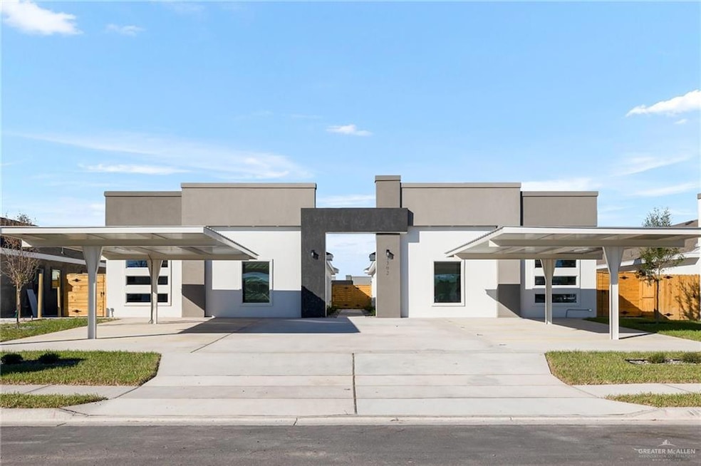 View of front of house with a carport