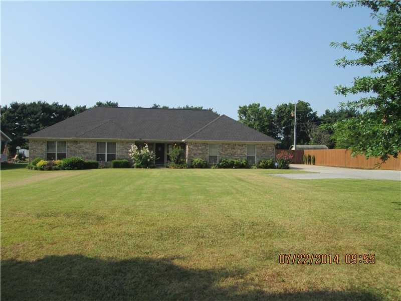 Exterior Front. Professionally Landscaped, Very at