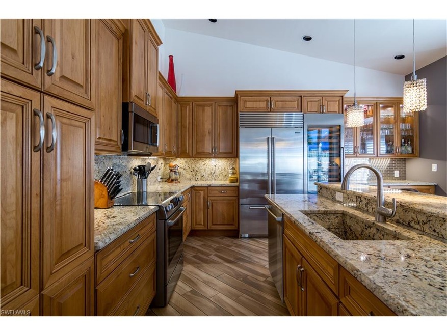 Kitchen with Subzero Fridge and wine cooler.   Bos