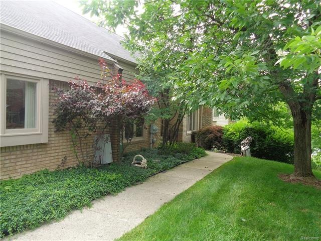 BEAUTIFULLY TREED & LANDSCAPED FRONT ENTRY
