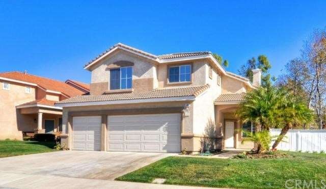Home boasts a 3-car garage and beautiful curb appe