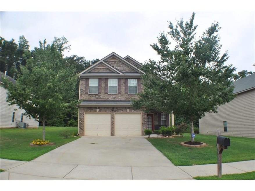 FIVE BEDROOM HOME IN FAIRBURN WITH CURB APPEAL