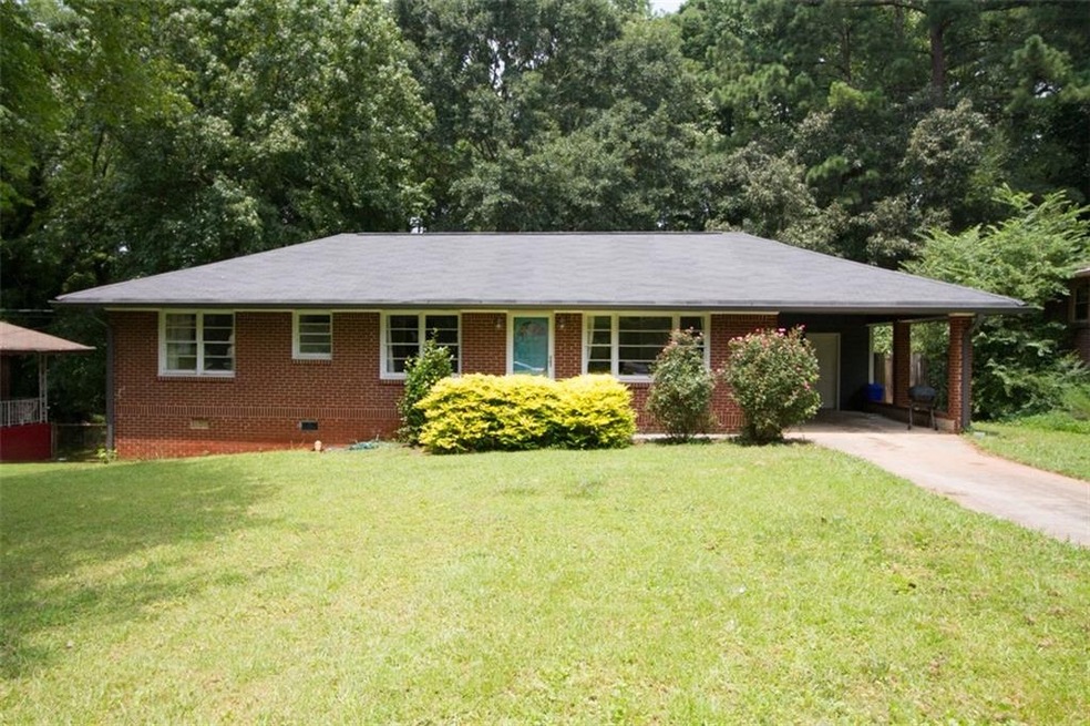 Come home to this charming brick ranch!